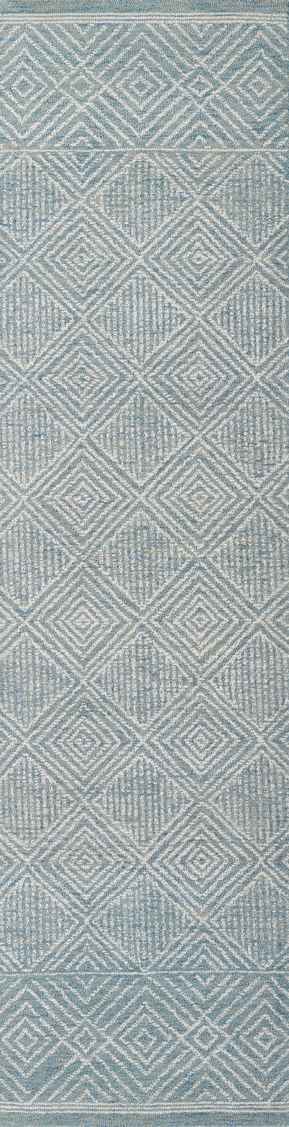 Blue woven rug featuring a white diamond lattice pattern and subtle geometric texture.