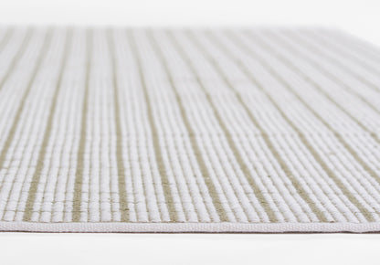 Malmo striped rug in cream and gray tones, flat-weave with soft textured surface.