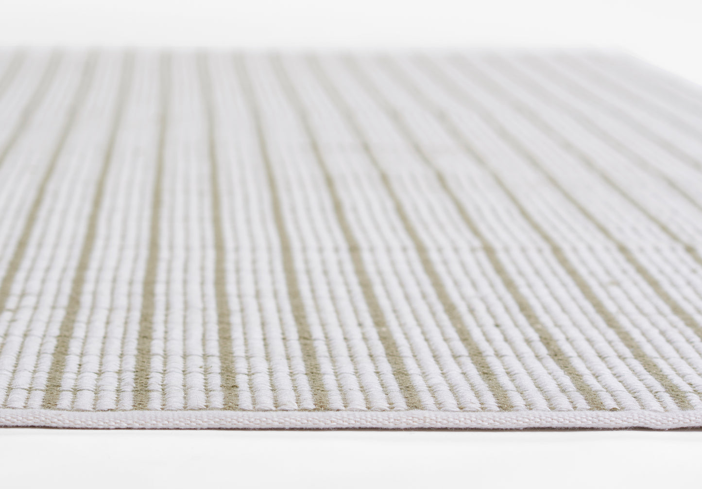 Beige and ivory striped woven area rug with a low-pile, ribbed texture for living spaces.