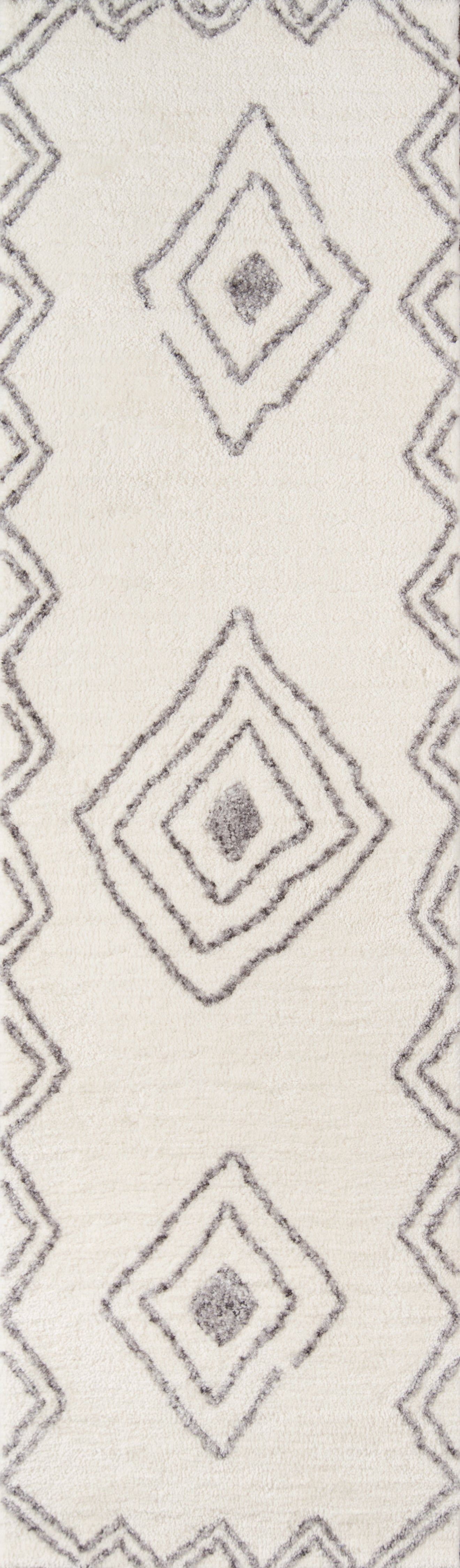 Cream ivory rug with grey diamond medallions and border, soft plush texture.