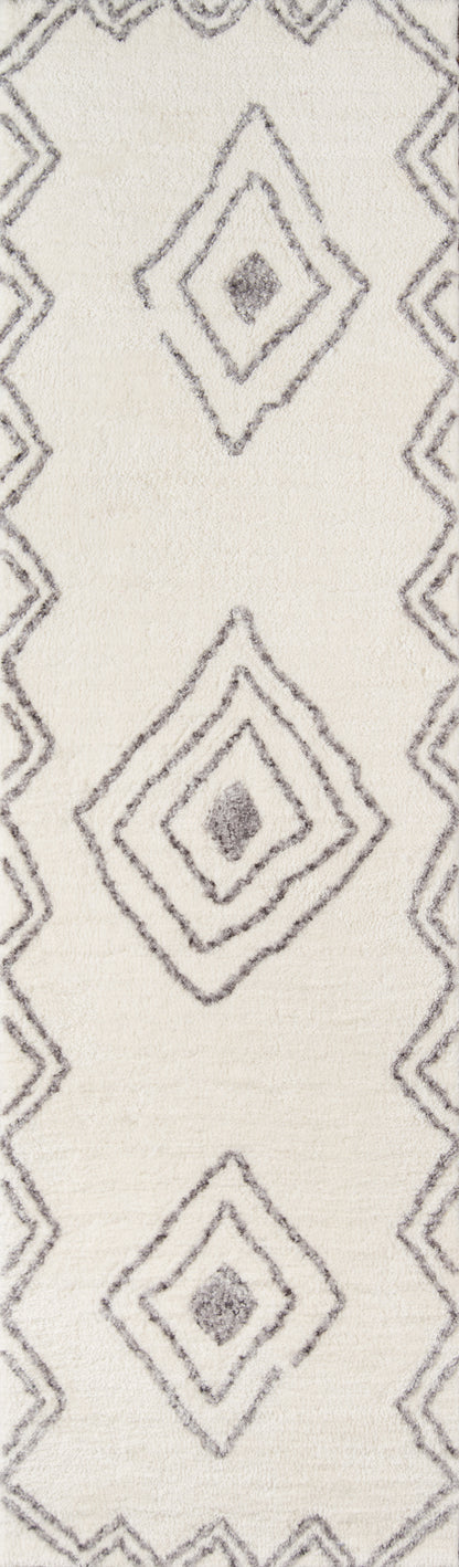 Cream ivory rug with grey diamond medallions and border, soft plush texture.
