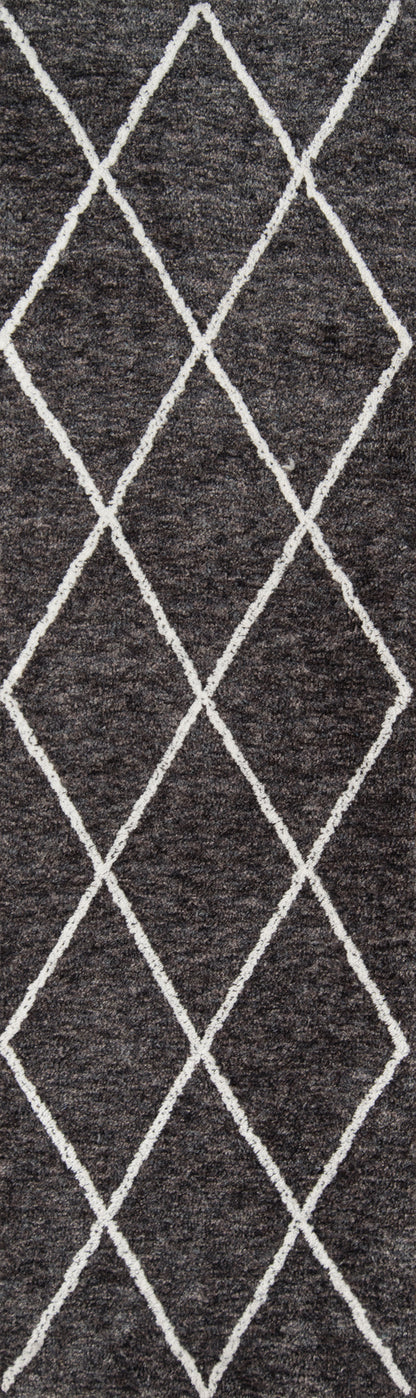 Charcoal shag rug with white diamond lattice pattern and plush textured pile.