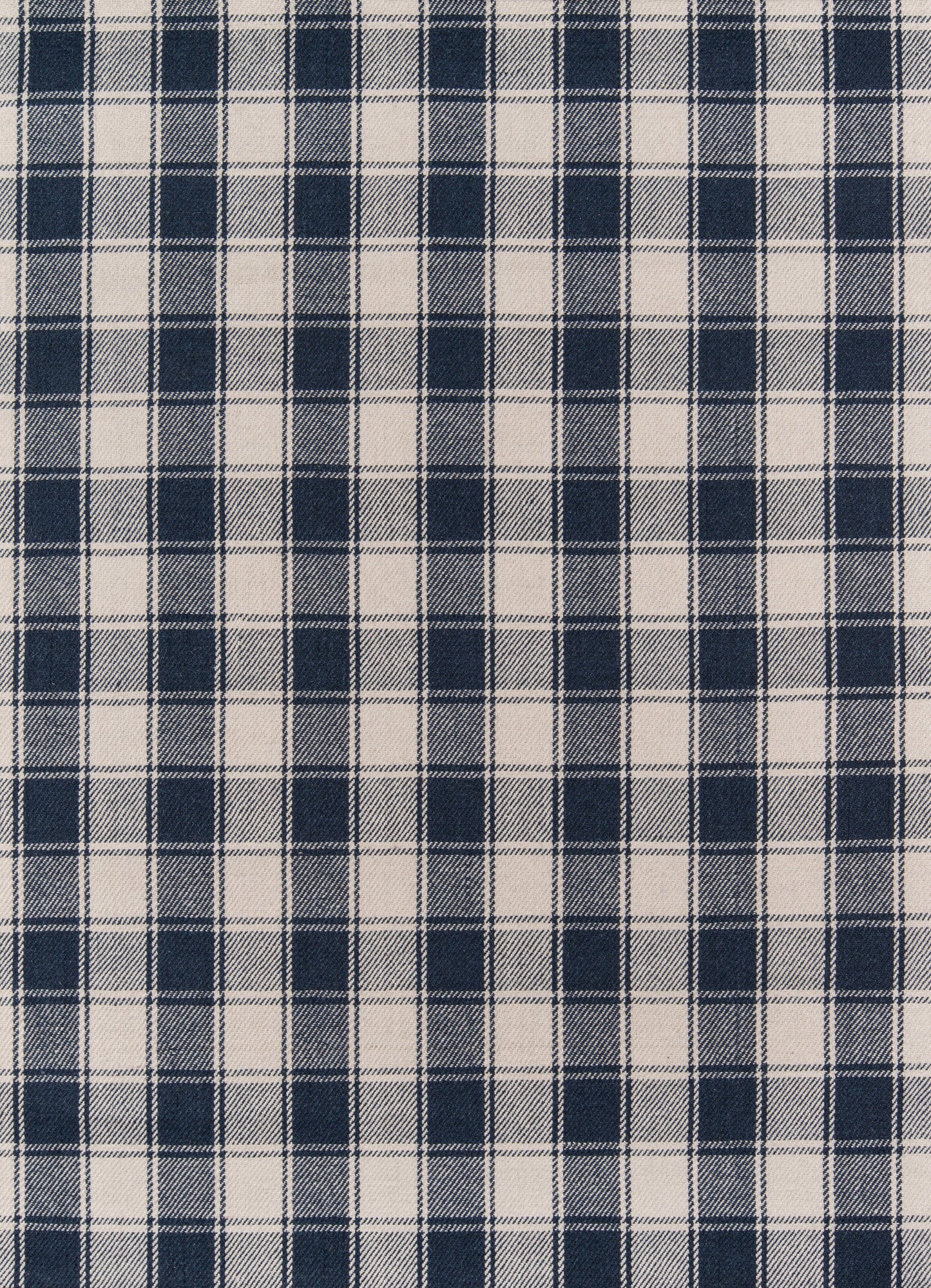 Navy blue and white plaid cotton fabric with small checks, textile swatch.
