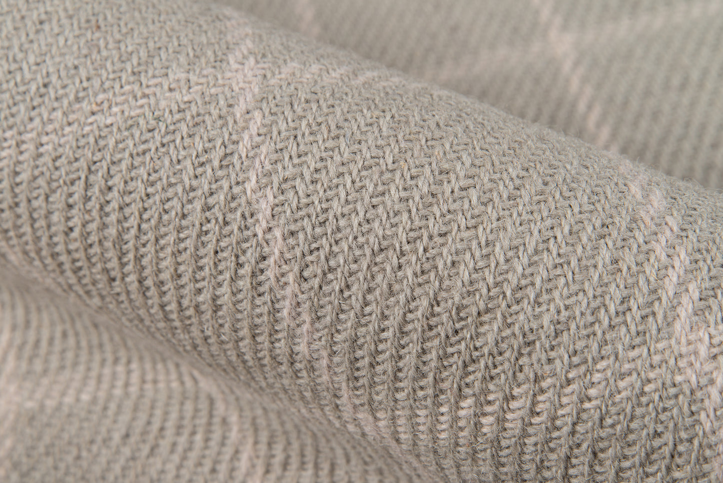Close-up of heather gray ribbed knit fabric with a soft, cozy texture.