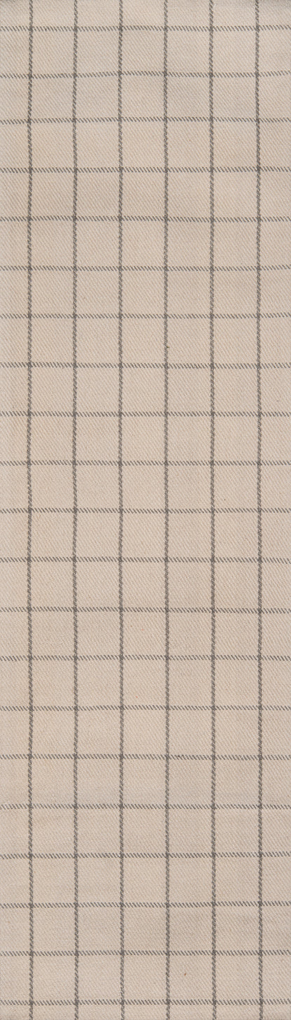 Beige woven rug with dark gray windowpane grid pattern, classic check design.