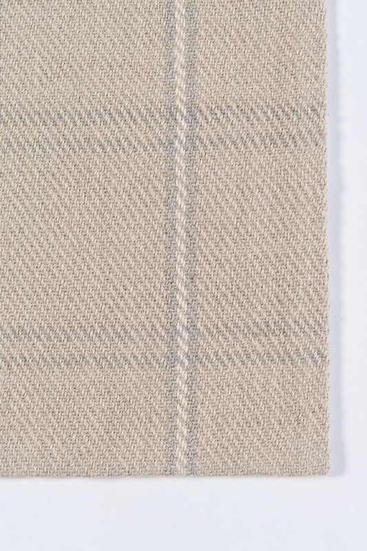 Beige knit wool-like rug with pale grey vertical stripe.