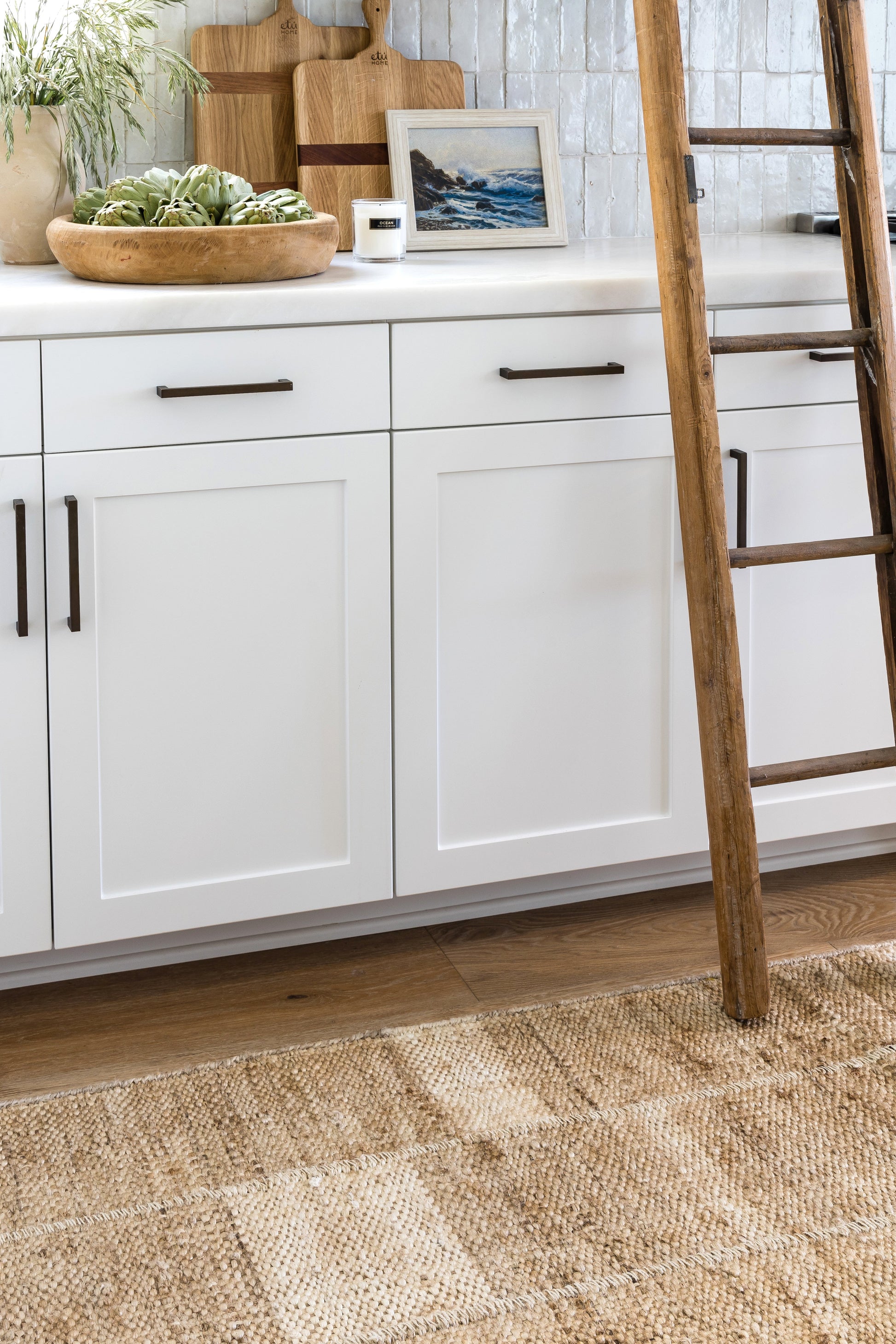 5' x 8' neutral-toned rug with a subtle pattern