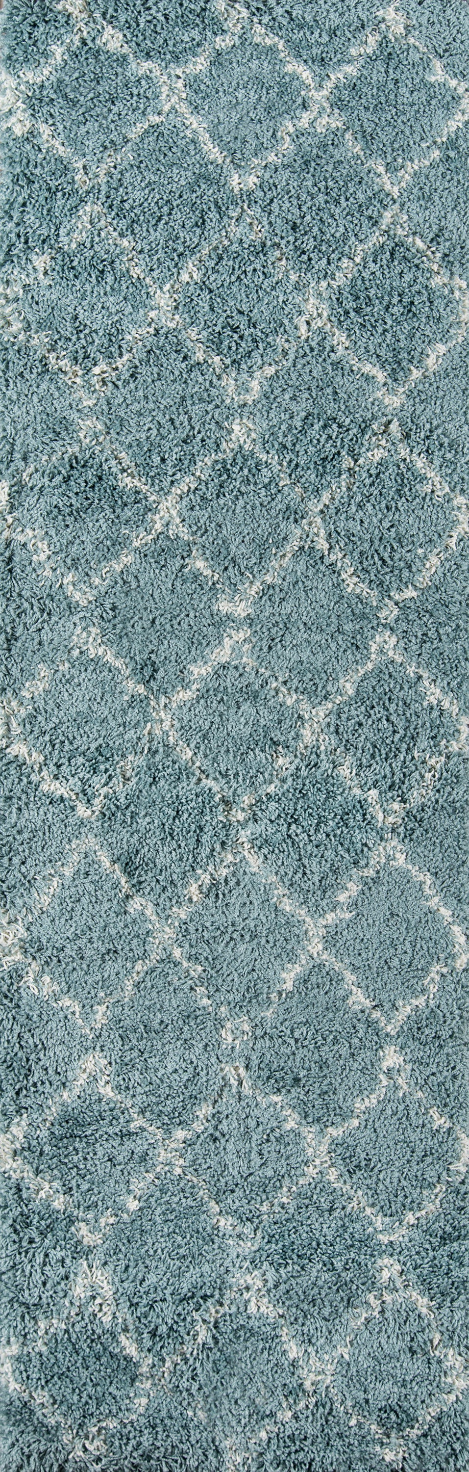 Maya blue shag rug with white diamond lattice pattern; plush, high-pile texture.