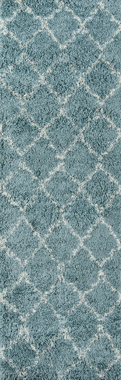 Maya blue shag rug with white diamond lattice pattern; plush, high-pile texture.