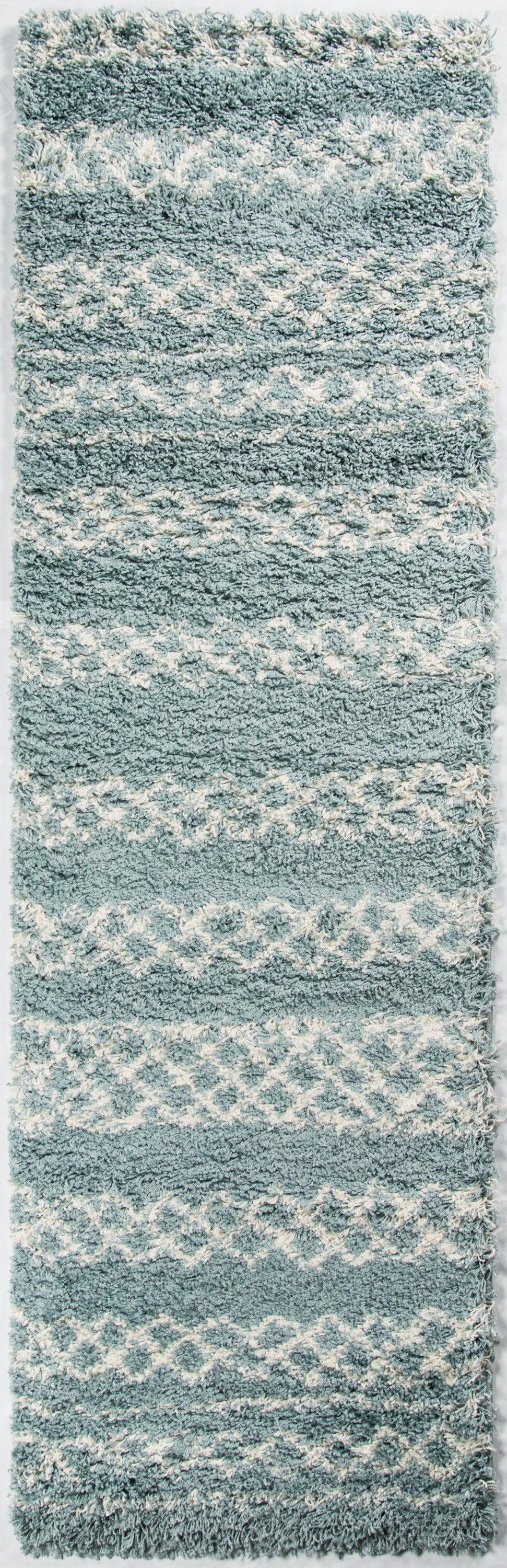 Blue shag rug with ivory stripes and geometric pattern; plush fluffy pile, rectangular area rug for living spaces.