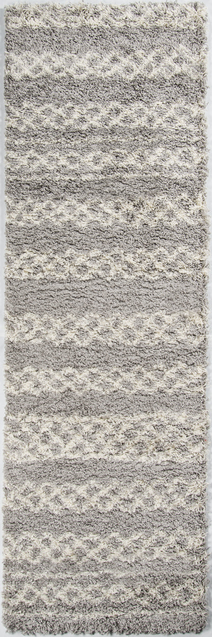 Rectangular gray shag rug with cream wavy stripes; plush high-pile for a cozy modern floor.