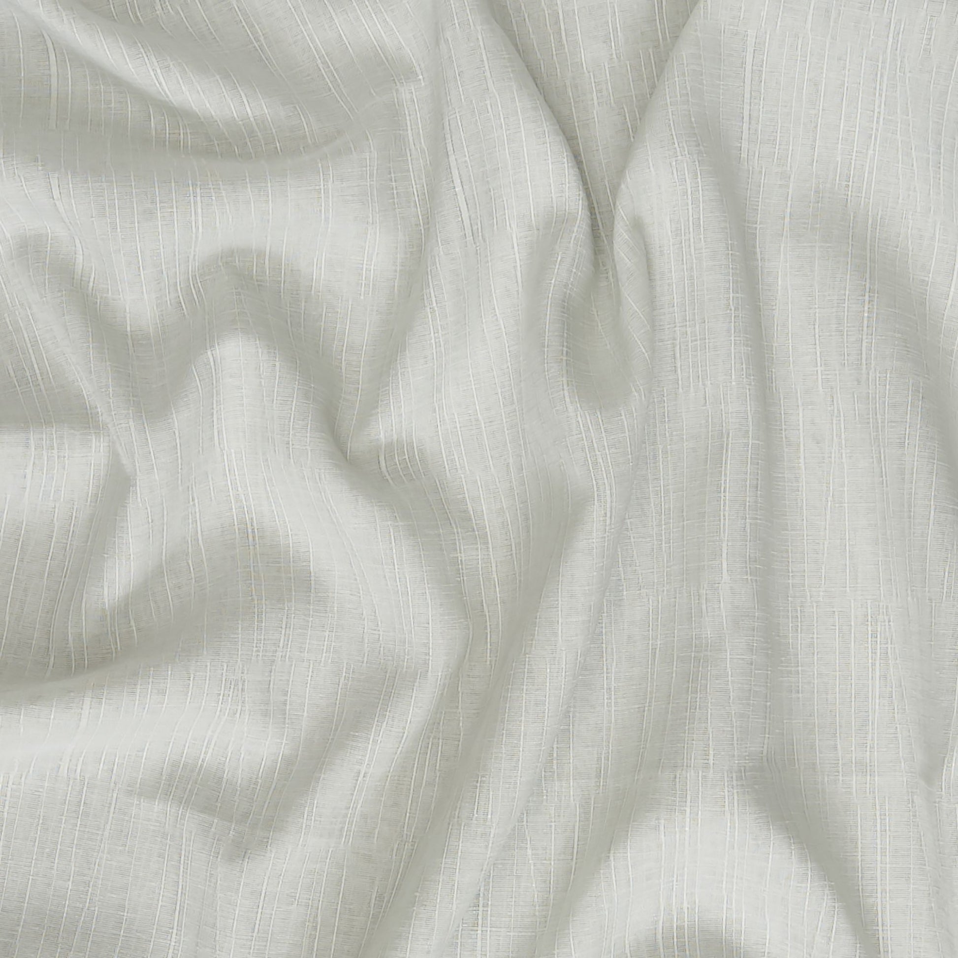 Green sheer jacquard fabric with soft drape and subtle texture; ideal for curtains or lightweight apparel.