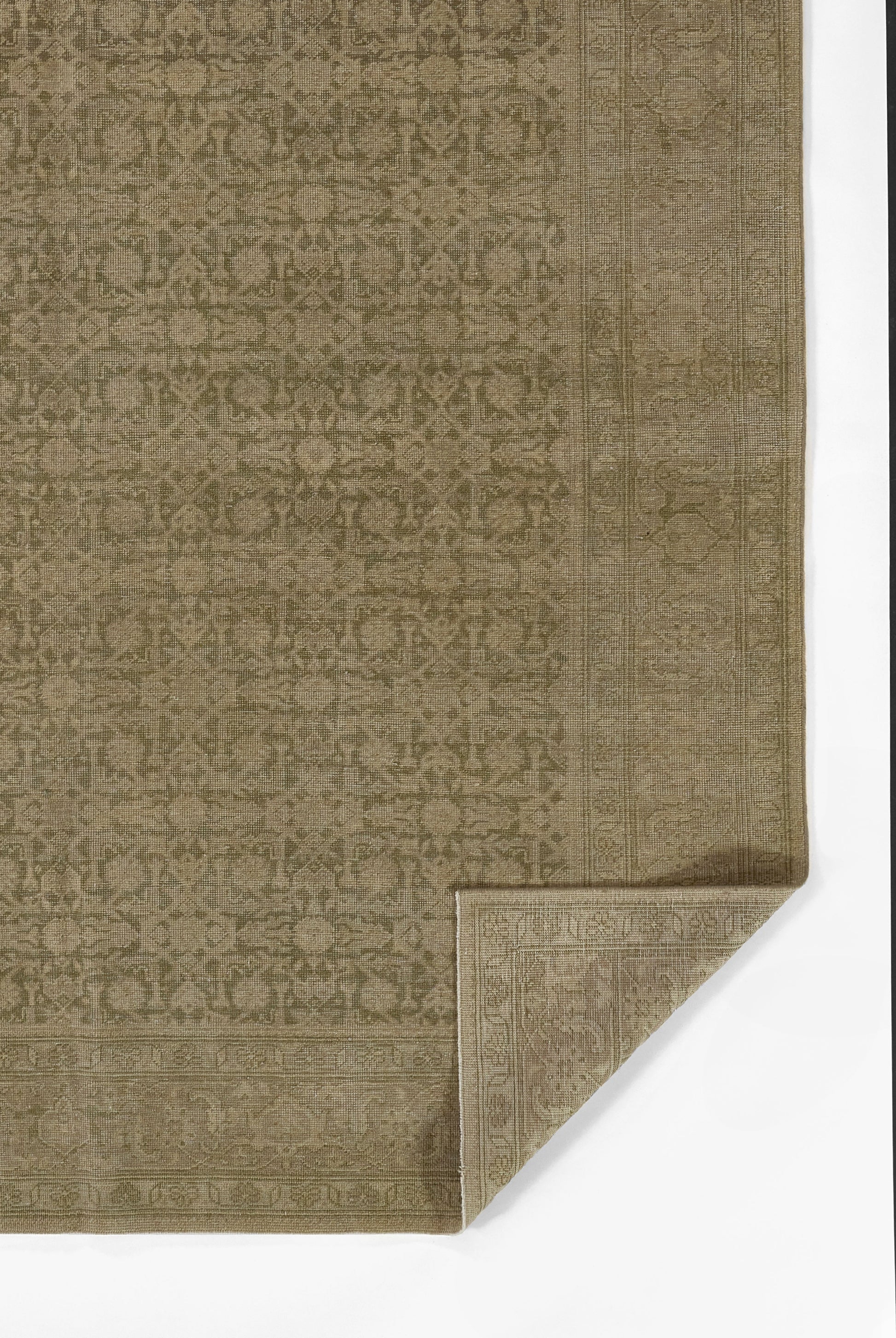 Olive-green oriental runner rug with subtle floral motifs and bordered edges; folded corner shows underside.