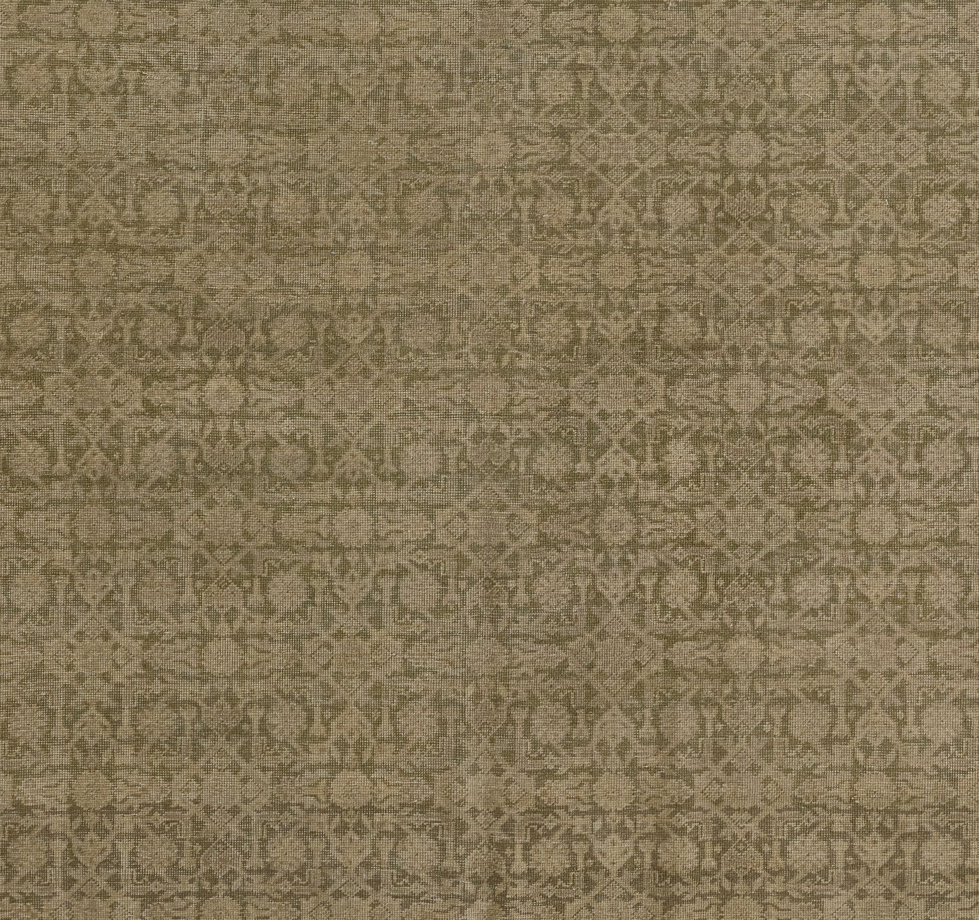 Olive-green patterned rug with an intricate vintage motif; woven rug.