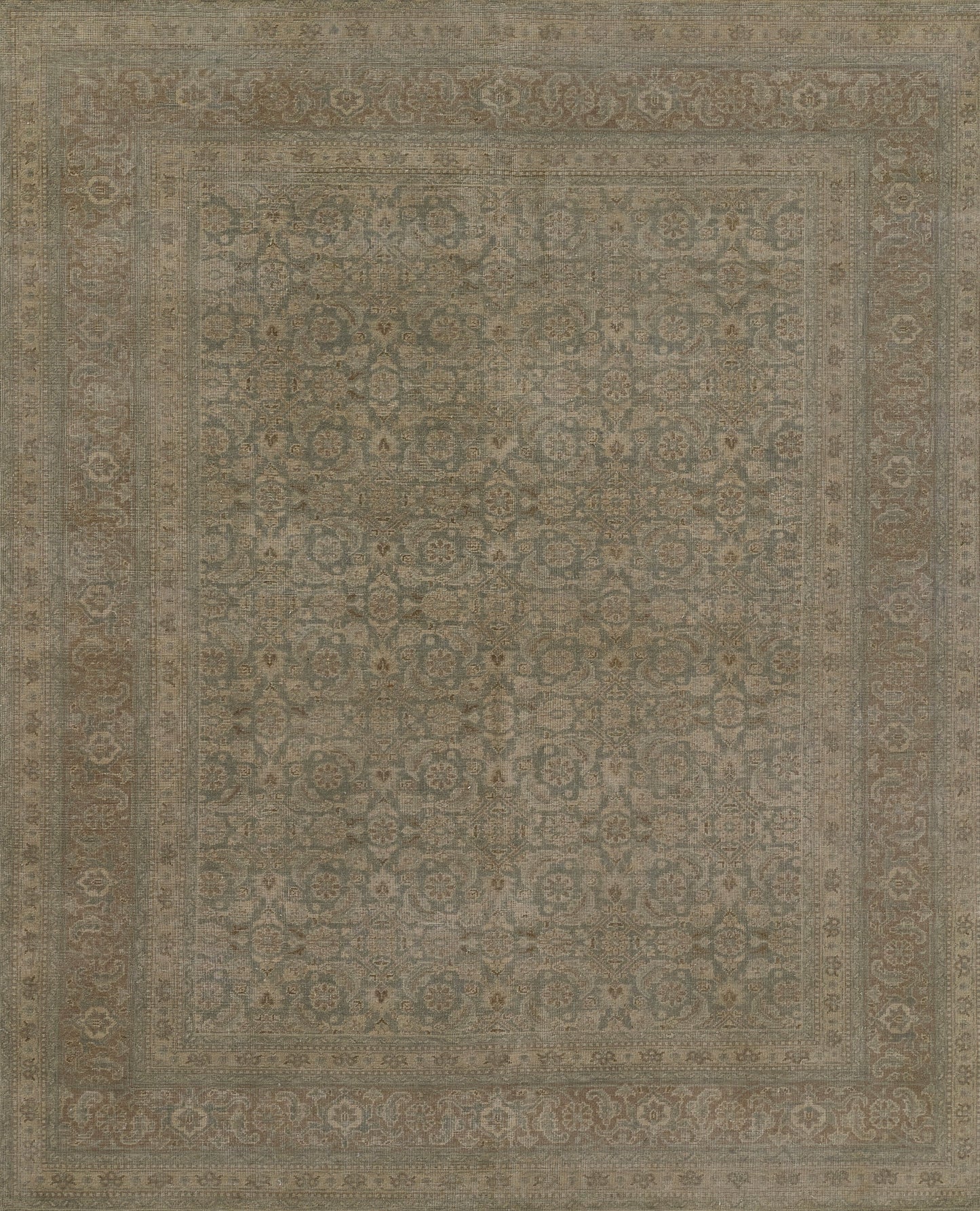 Muted blue and beige distressed Persian-style area rug with ornate floral motifs and bordered edges.