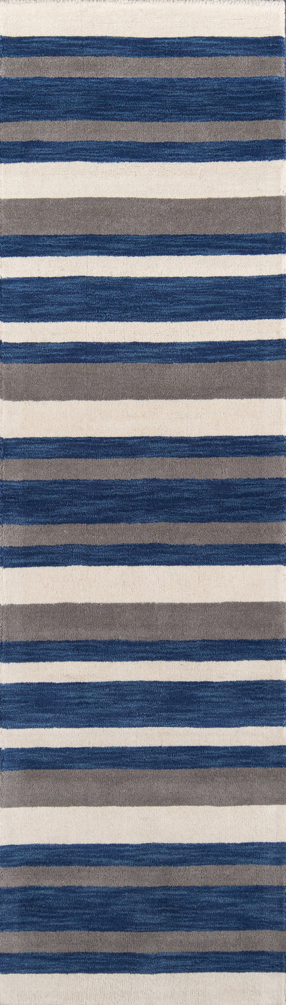 Navy blue, gray and cream striped shag rug with horizontal bands; modern coastal style, plush pile.