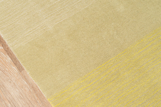 Abstract tri-tone pattern with sandy beige field, mustard-yellow diagonal stripe, and light brown wood texture.