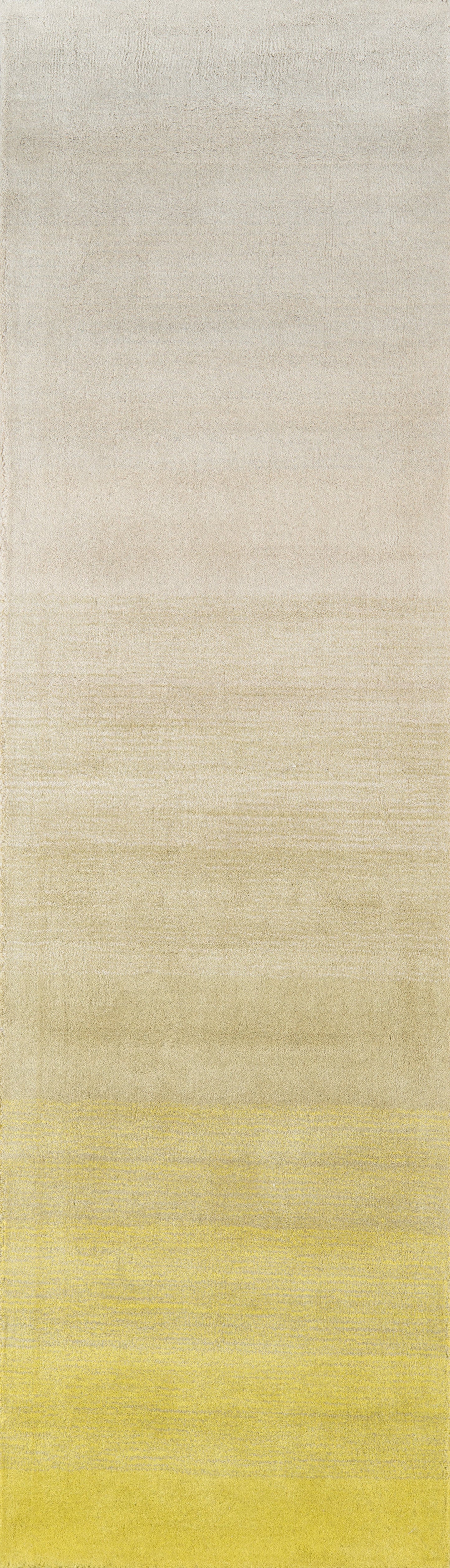 Ivory to pale yellow gradient rug with a soft textured weave; rectangular modern area rug.