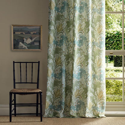 William Morris “Lent Lily” Fabric in Lemon Balm featuring yellow daffodils and green foliage on linen, perfect for drapery, cushions, or elegant upholstery.