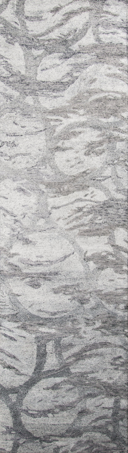 Grey, stone-like pattern area rug with textured marbled swirls; modern, neutral decor for living spaces.