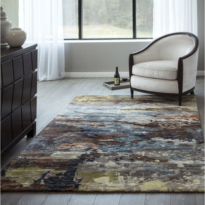 Living room with multicolor abstract rug, cream upholstered armchair with dark wood frame, tray with wine by window.