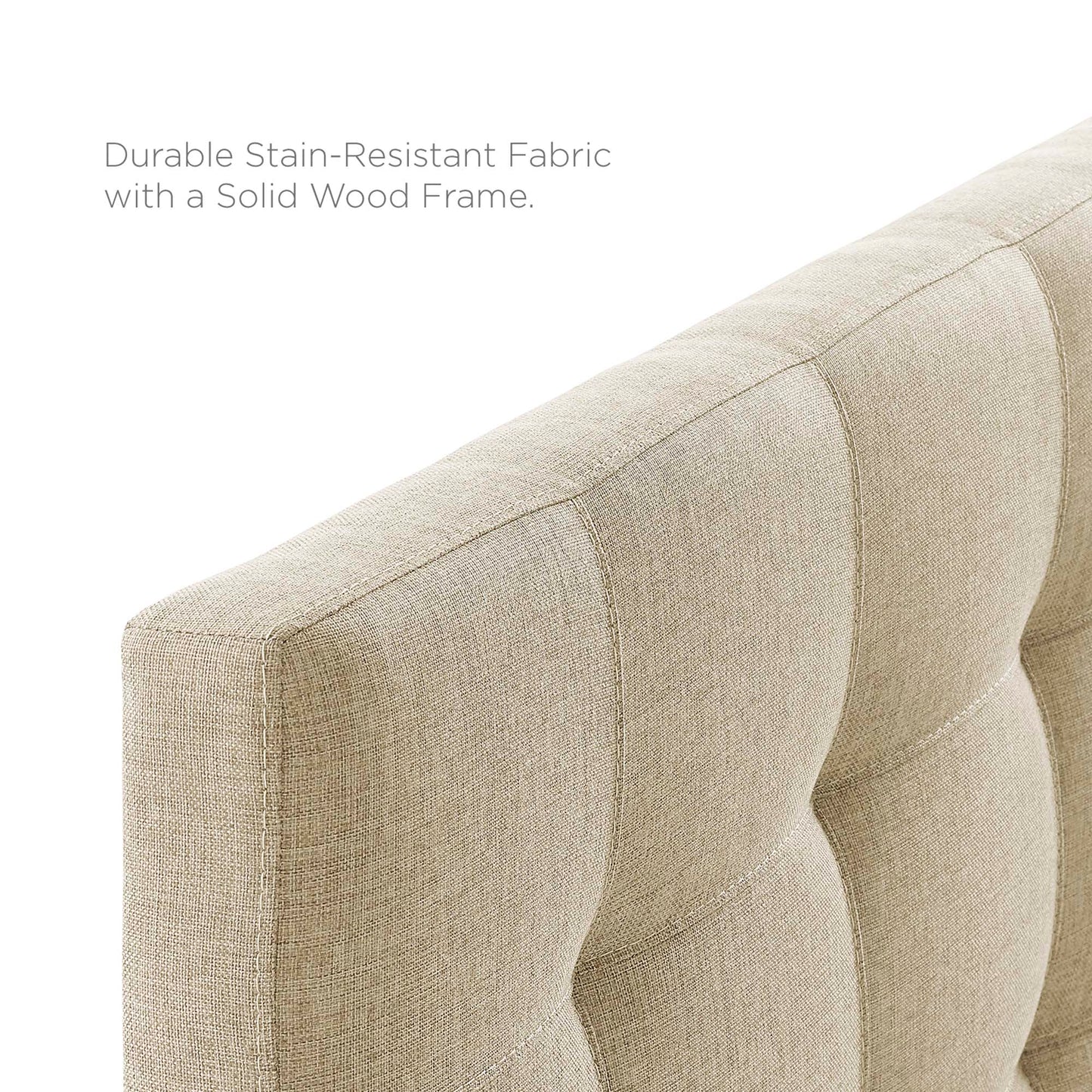 Beige upholstered fabric full headboard with tufted square panels.