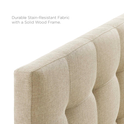 Beige upholstered fabric full headboard with tufted square panels.