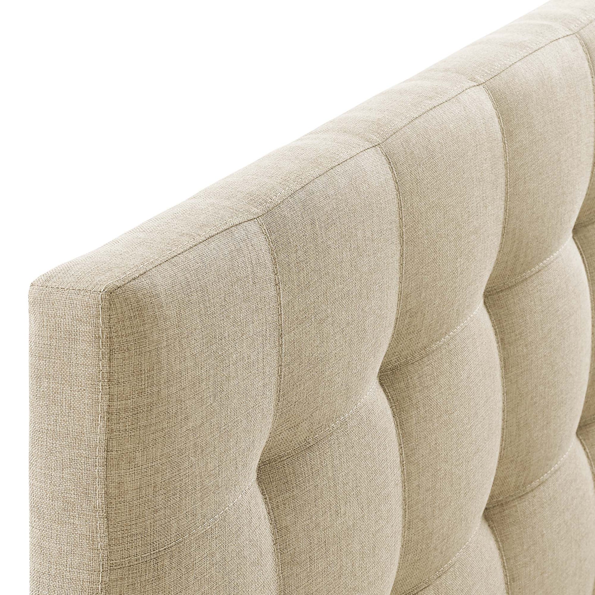 Beige tufted fabric headboard with square tufting and textured upholstery.