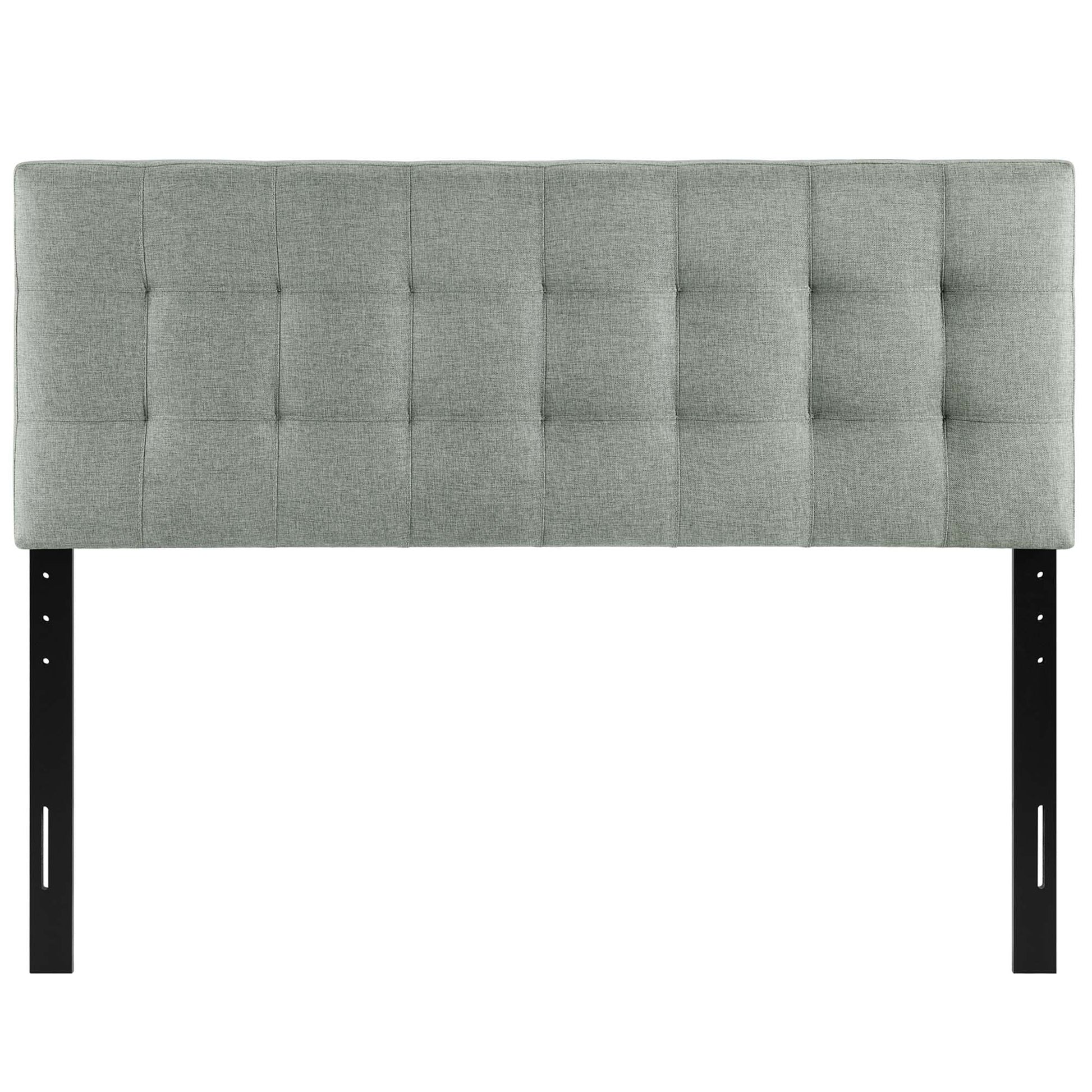 Gray tufted fabric headboard with square grid pattern, mounted on black metal legs for bed frame.