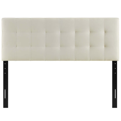 Ivory tufted upholstered headboard with square panels mounted on black metal legs, modern bed centerpiece.