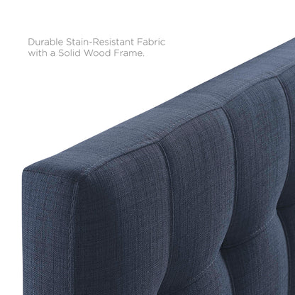 Navy blue upholstered fabric twin headboard with vertical channel tufting and solid wood frame.