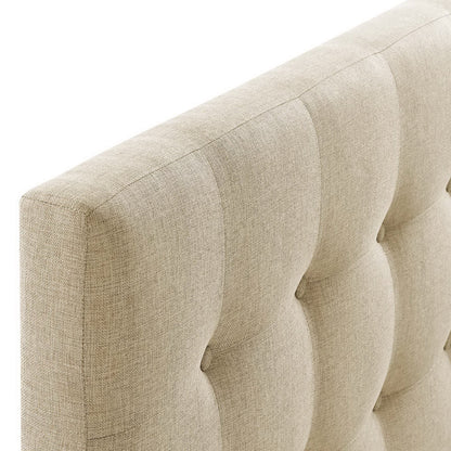 Beige upholstered fabric queen headboard with vertical channel tufting; close-up of texture.