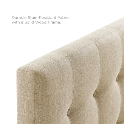 Beige upholstered fabric king headboard for a bedroom.