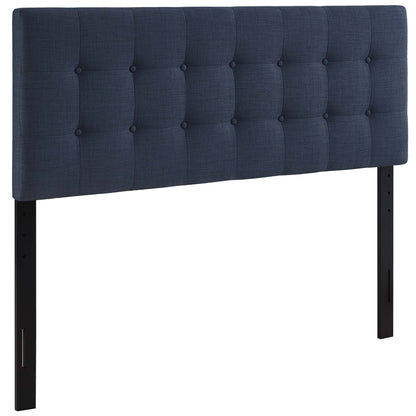 Navy blue button-tufted fabric headboard with black metal legs, contemporary bedroom style.