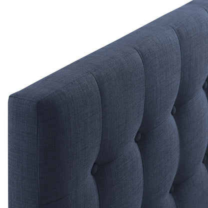 Navy blue tufted fabric headboard with vertical channels and buttons, king size.