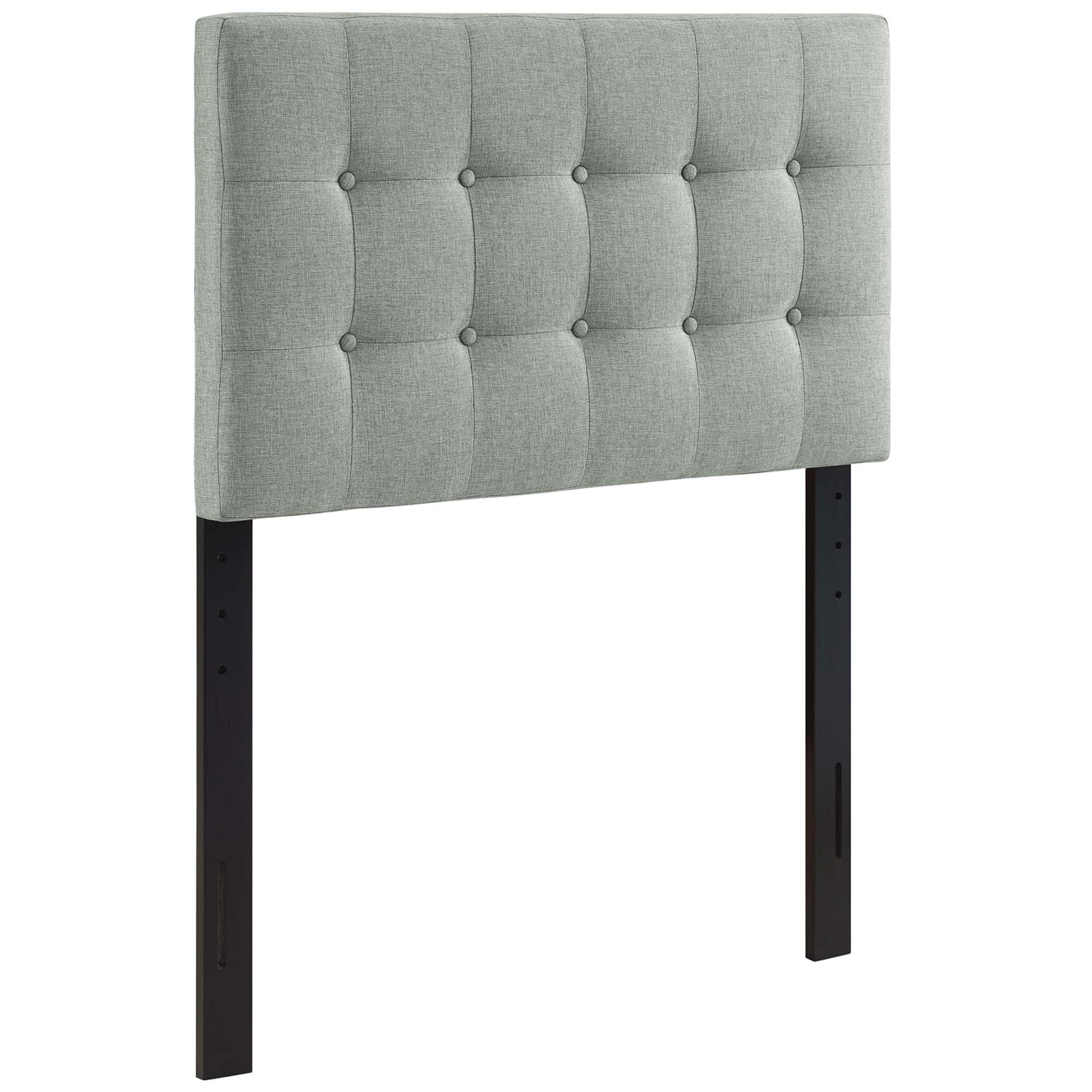 Grey fabric tufted twin headboard with square button tufts & black metal legs.