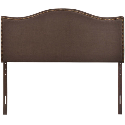 Dark brown upholstered headboard with curved top and brass nailhead trim.