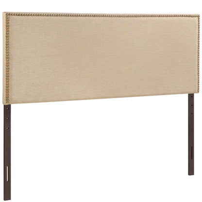 Brown upholstered headboard with brass nailhead trim and dark brown wooden legs.