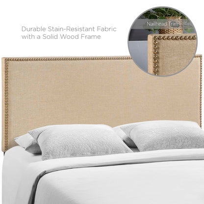 Brown upholstered headboard with nailhead trim on a solid wood frame; white bedding and pillows.