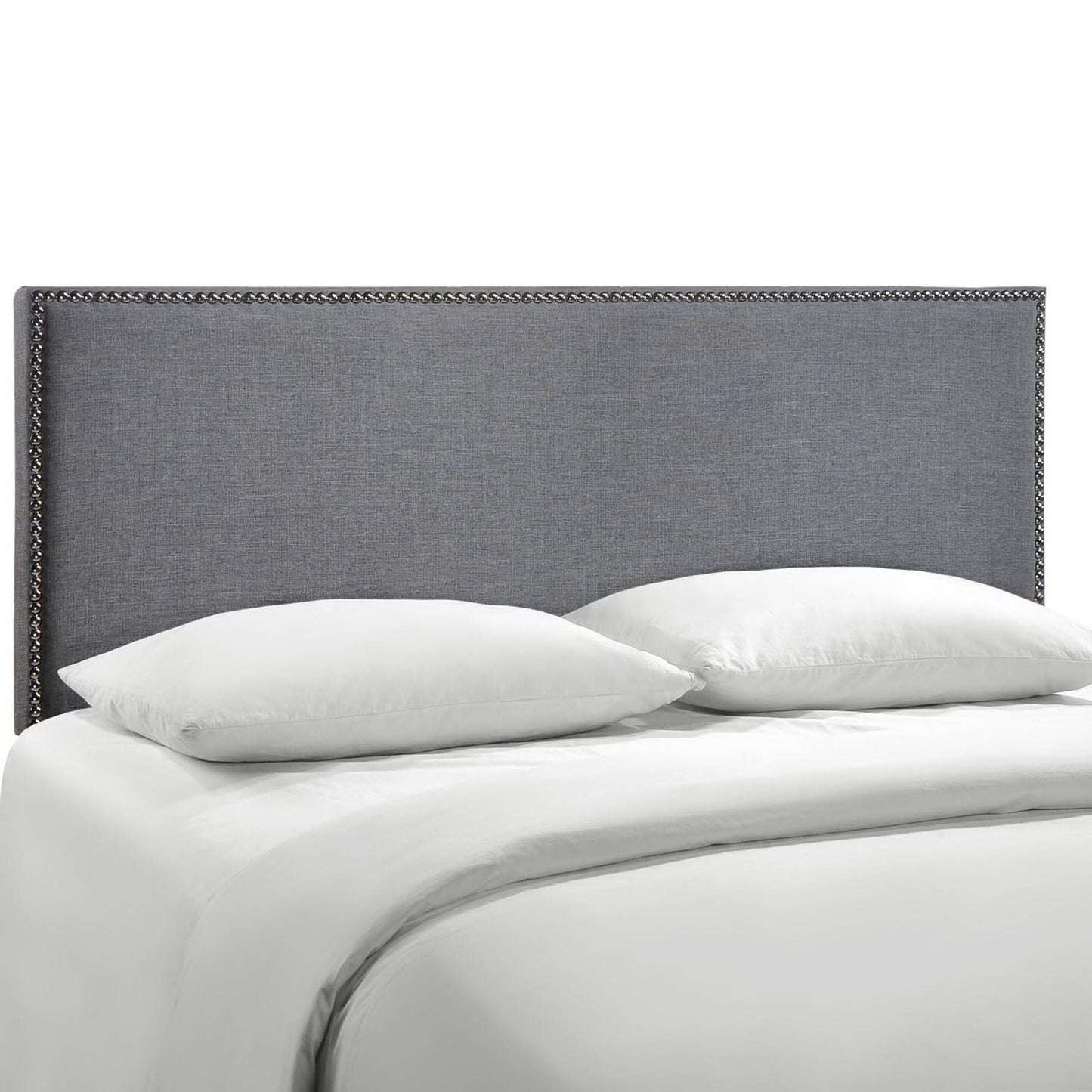 Black fabric upholstered queen headboard with nailhead trim above white bedding and pillows on a modern bed.
