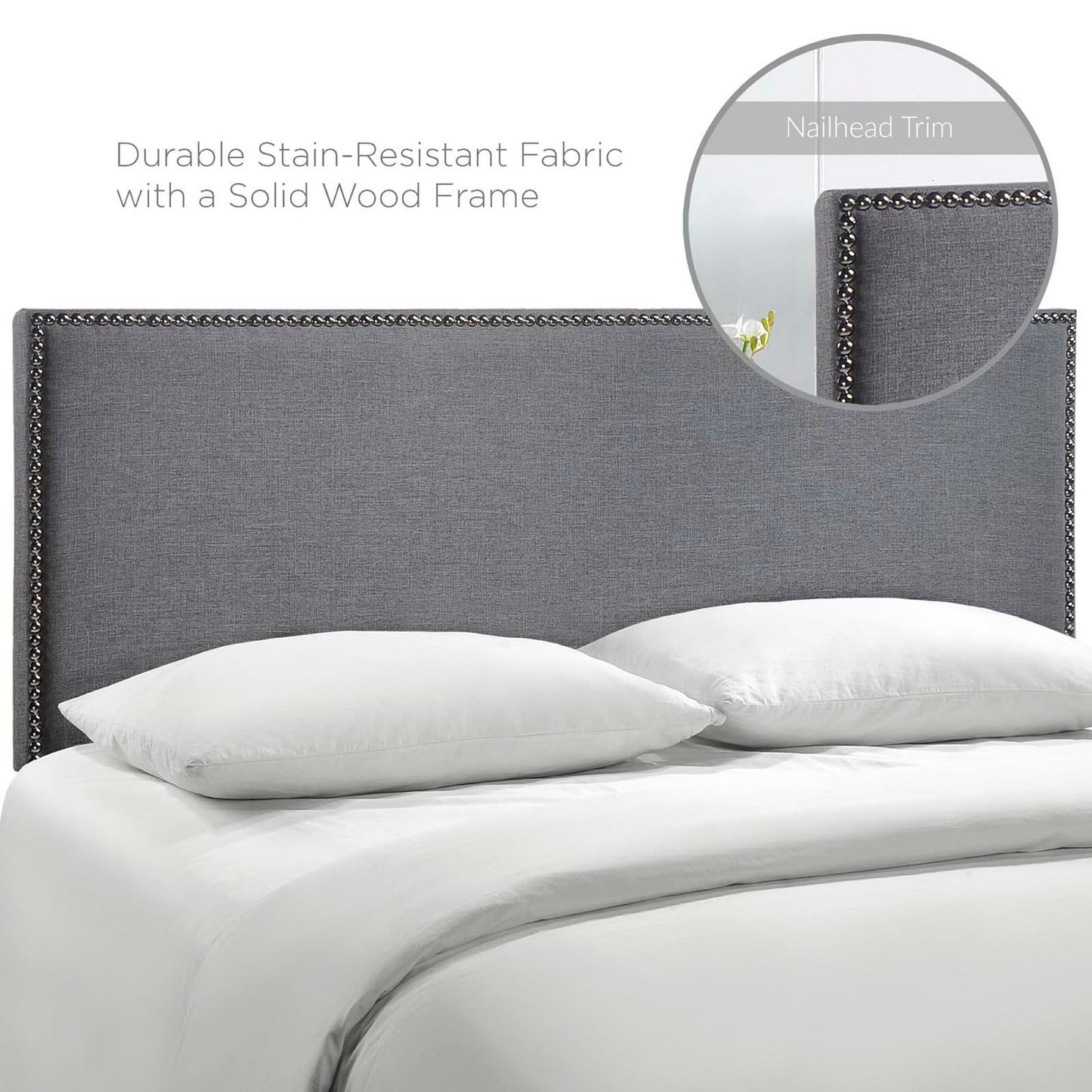 Black upholstered queen headboard with nailhead trim, stain-resistant fabric and solid wood frame, white bedding.
