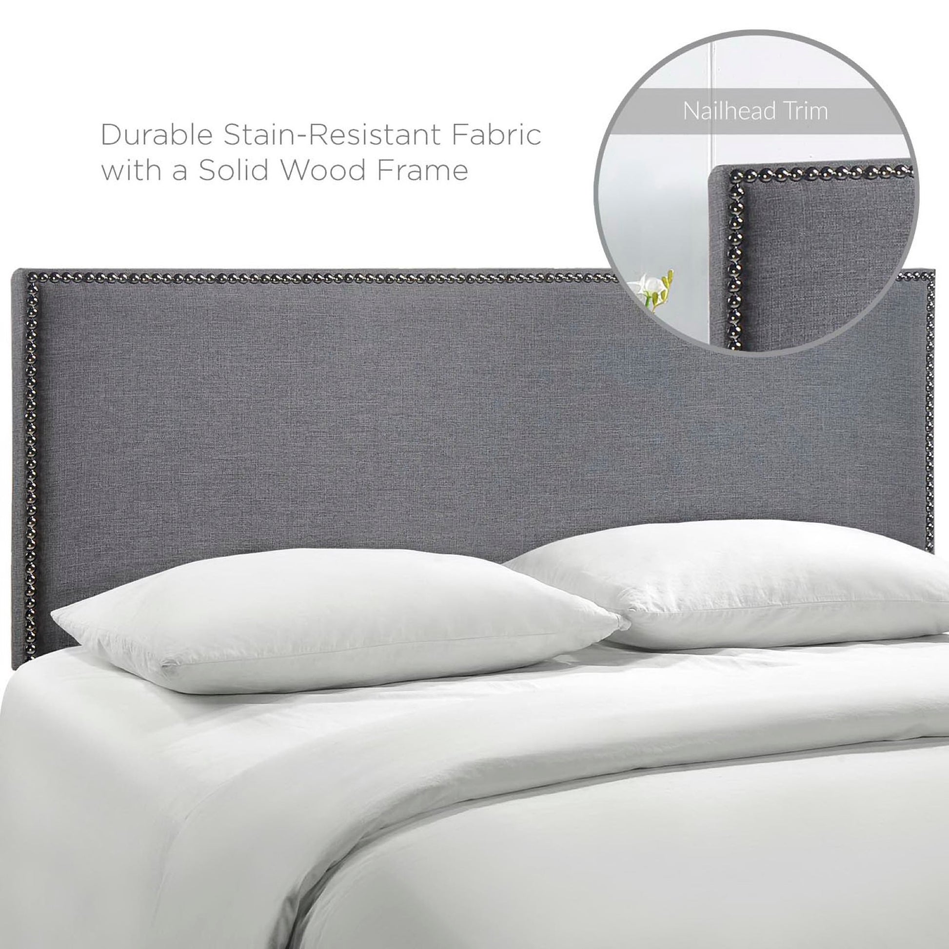 Black upholstered queen headboard with nailhead trim, stain-resistant fabric and solid wood frame, white bedding.