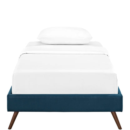 Blue fabric twin bed frame with white bedding and a single pillow, round splayed legs.