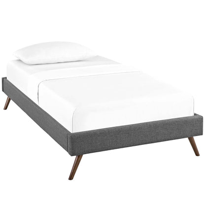 Gray fabric twin bed frame with round splayed legs and white bedding