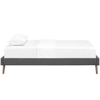 Grey fabric twin bed frame with round splayed legs, white mattress and pillow, modern minimalist style.