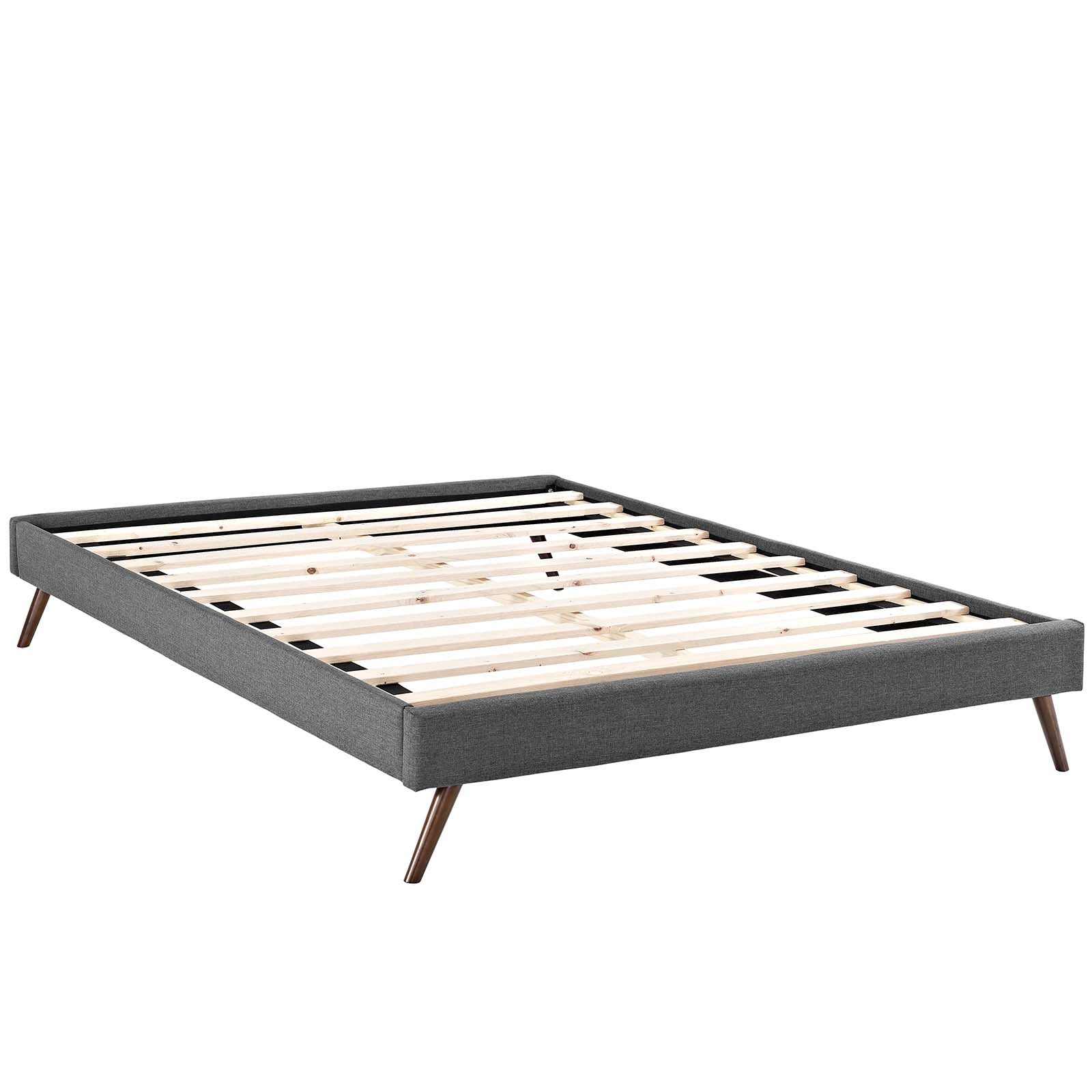 Low-profile grey fabric platform bed frame with natural wooden slats and round splayed legs