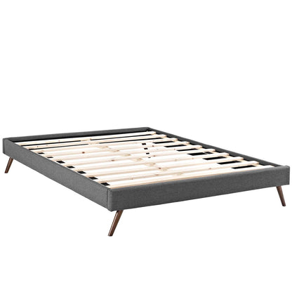 Low-profile grey fabric platform bed frame with natural wooden slats and round splayed legs