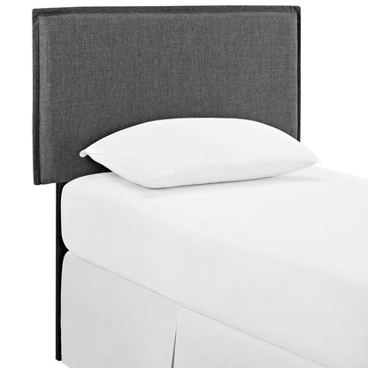 Gray fabric upholstered twin headboard.