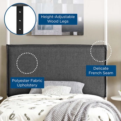 Grey upholstered twin headboard with a tall silhouette, polyester fabric, and delicate French seam.