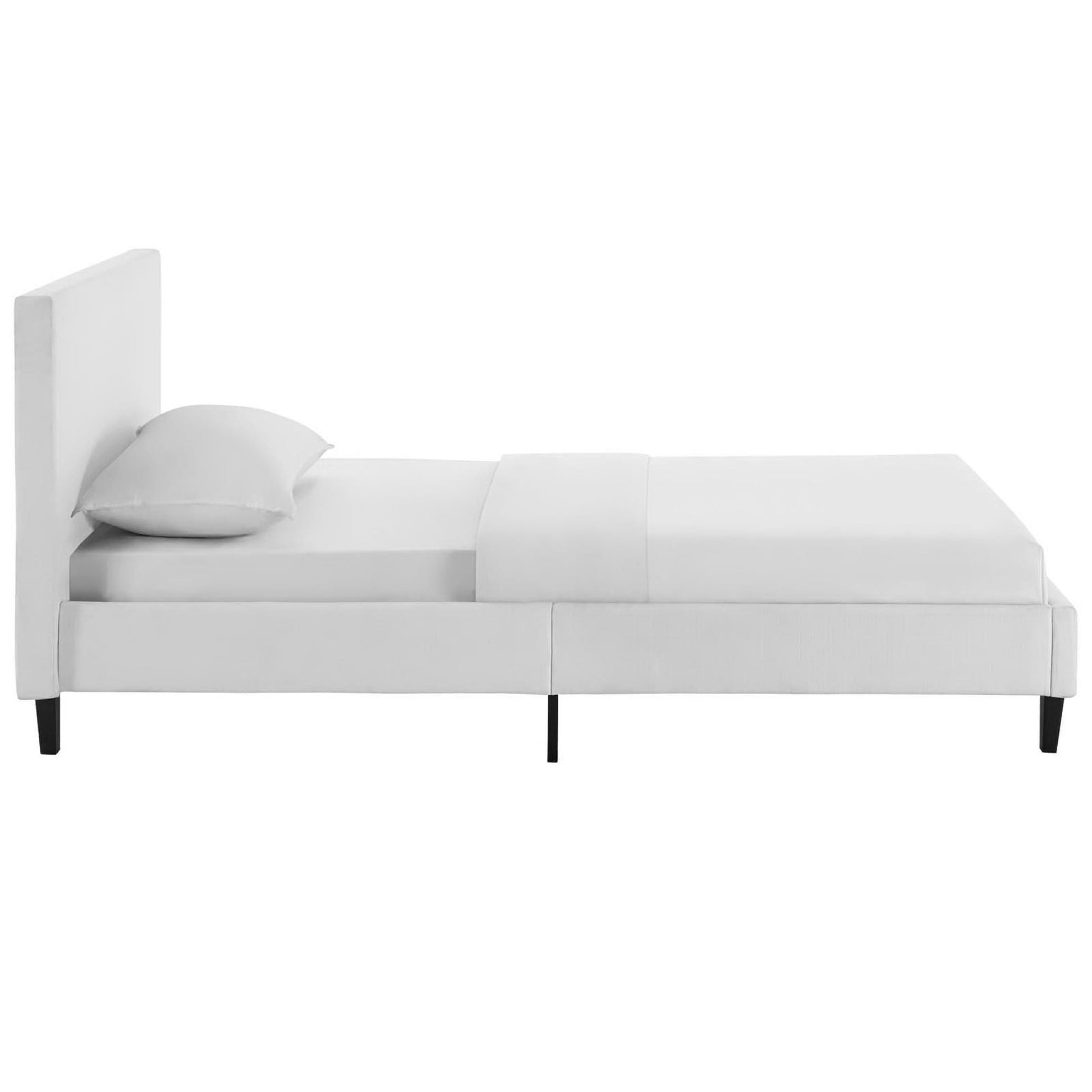 White upholstered platform twin bed with a tall padded headboard in a modern minimalist style.